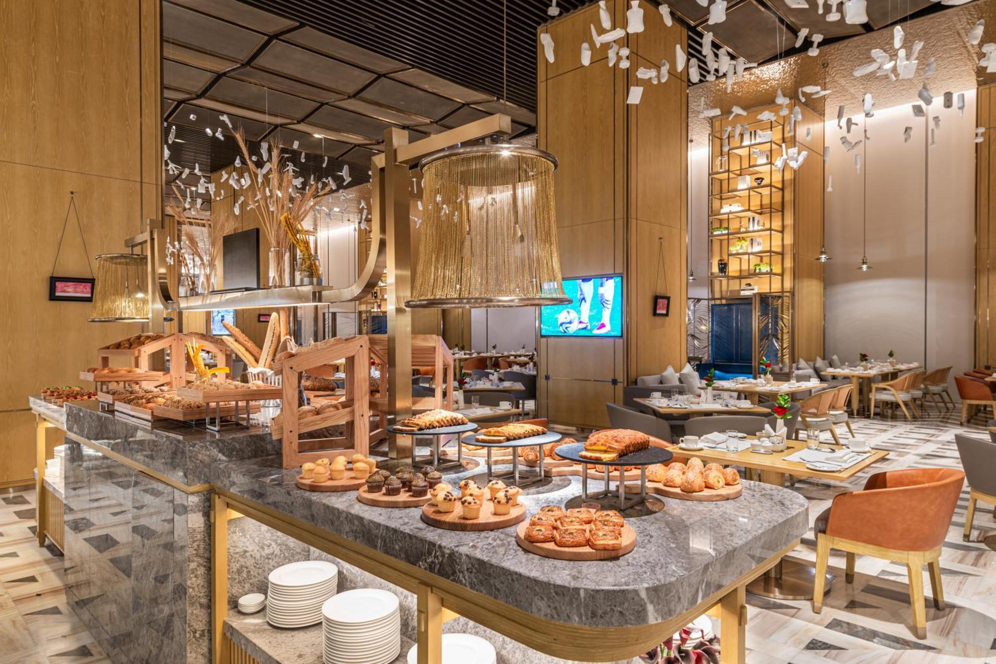 Narcissus The Royal Hotel Riadh Exterior foto The buffet at the hotel